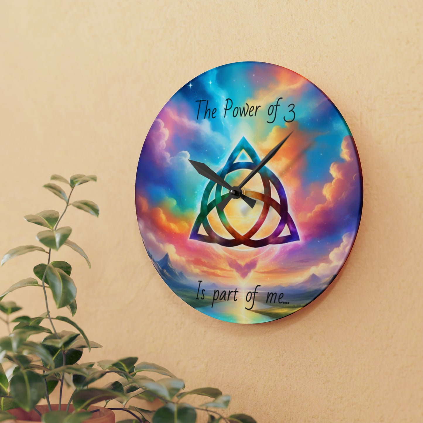 Acrylic Wall Clock, the power of 3 is part of me affirmation, brightly coloured sky with a triquetra symbol on it.