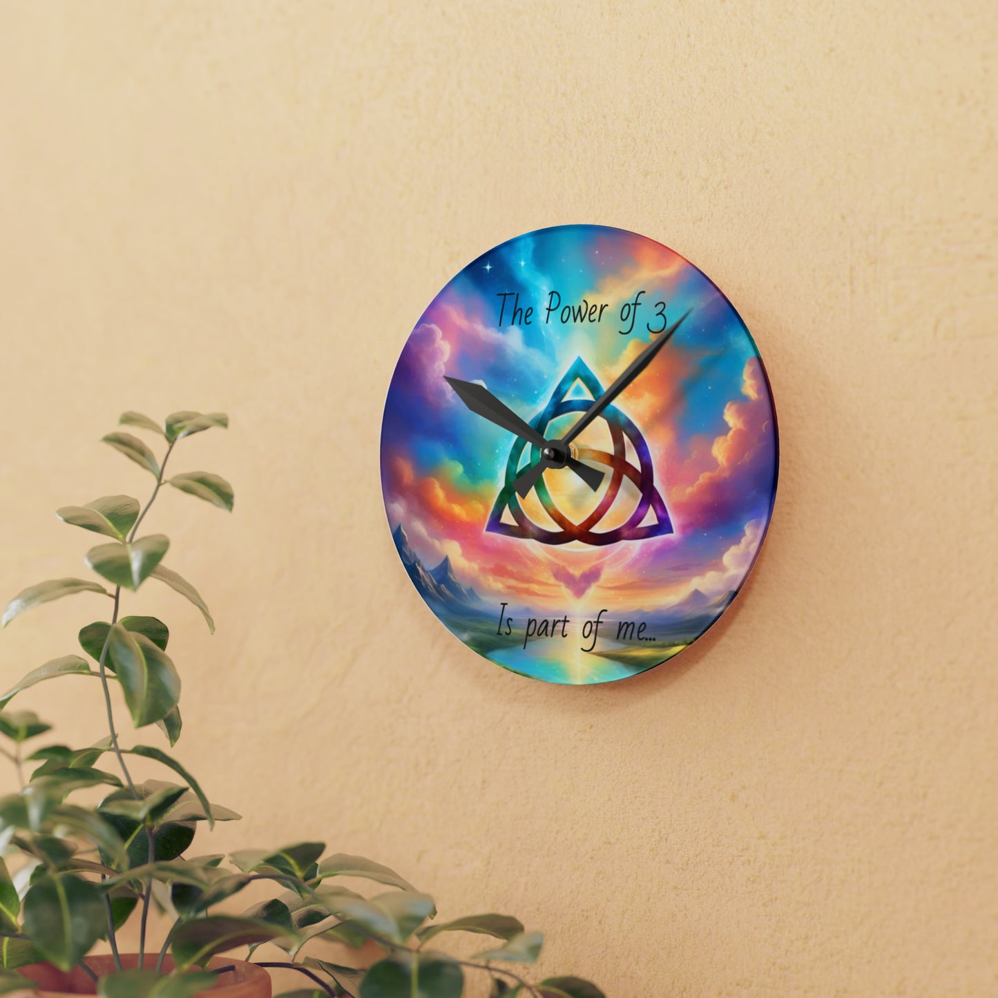 Acrylic Wall Clock, the power of 3 is part of me affirmation, brightly coloured sky with a triquetra symbol on it.