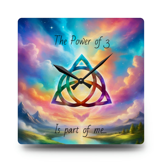 Acrylic Wall Clock, the power of 3 is part of me affirmation, brightly coloured sky with a triquetra symbol on it.