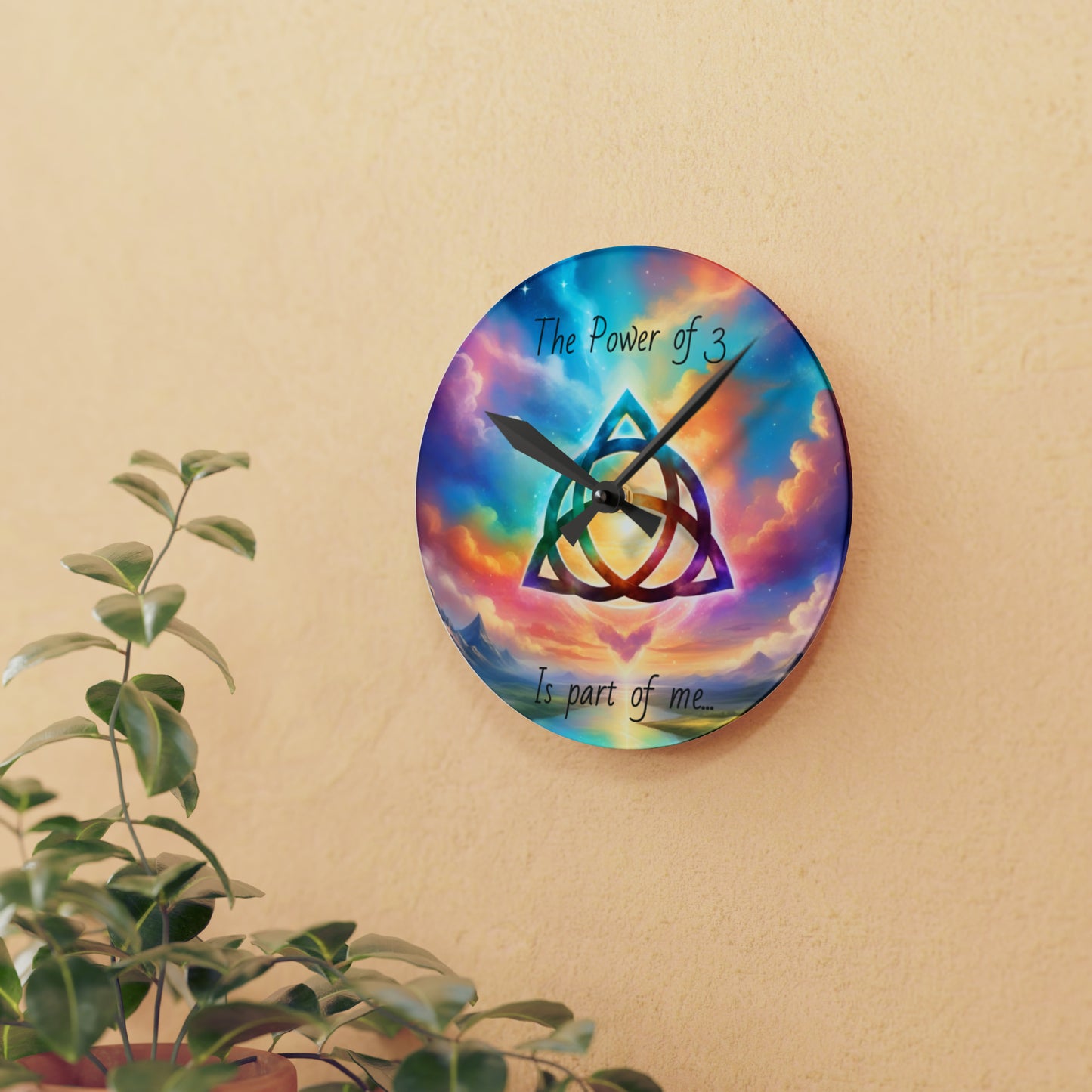 Acrylic Wall Clock, the power of 3 is part of me affirmation, brightly coloured sky with a triquetra symbol on it.