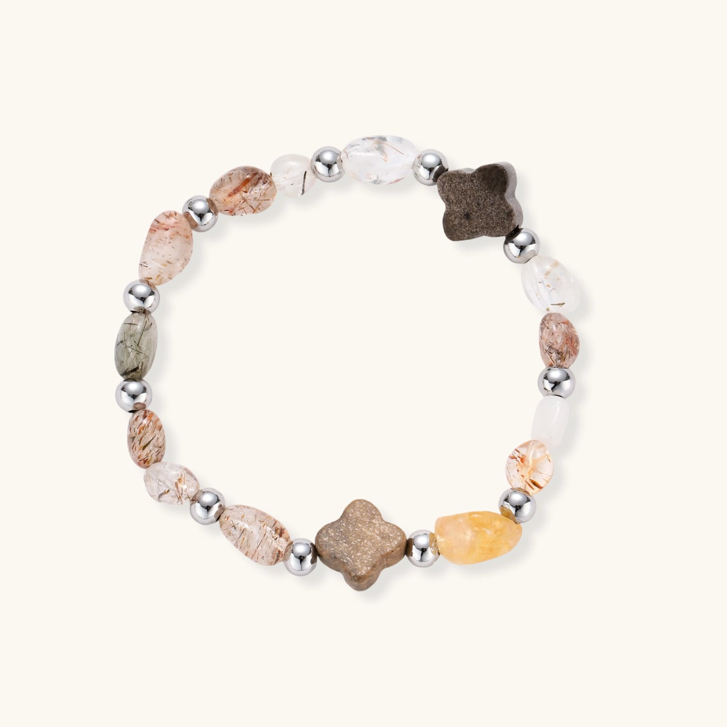 Stretch bracelet with coffee calcite, citrine, and black gold super seven stones mixed with silver beads on white background