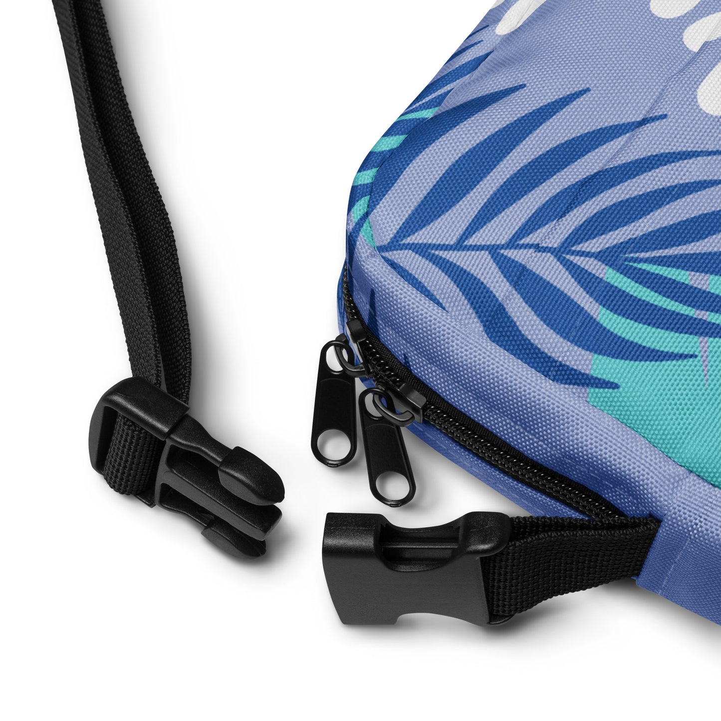 Utility crossbody bag, purple tropical design, water resistant and durable