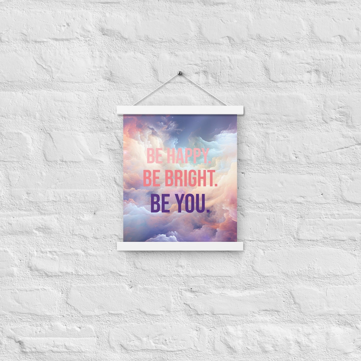 Poster with hangers, be bright, be happy, be you text on background of soft colorful clouds