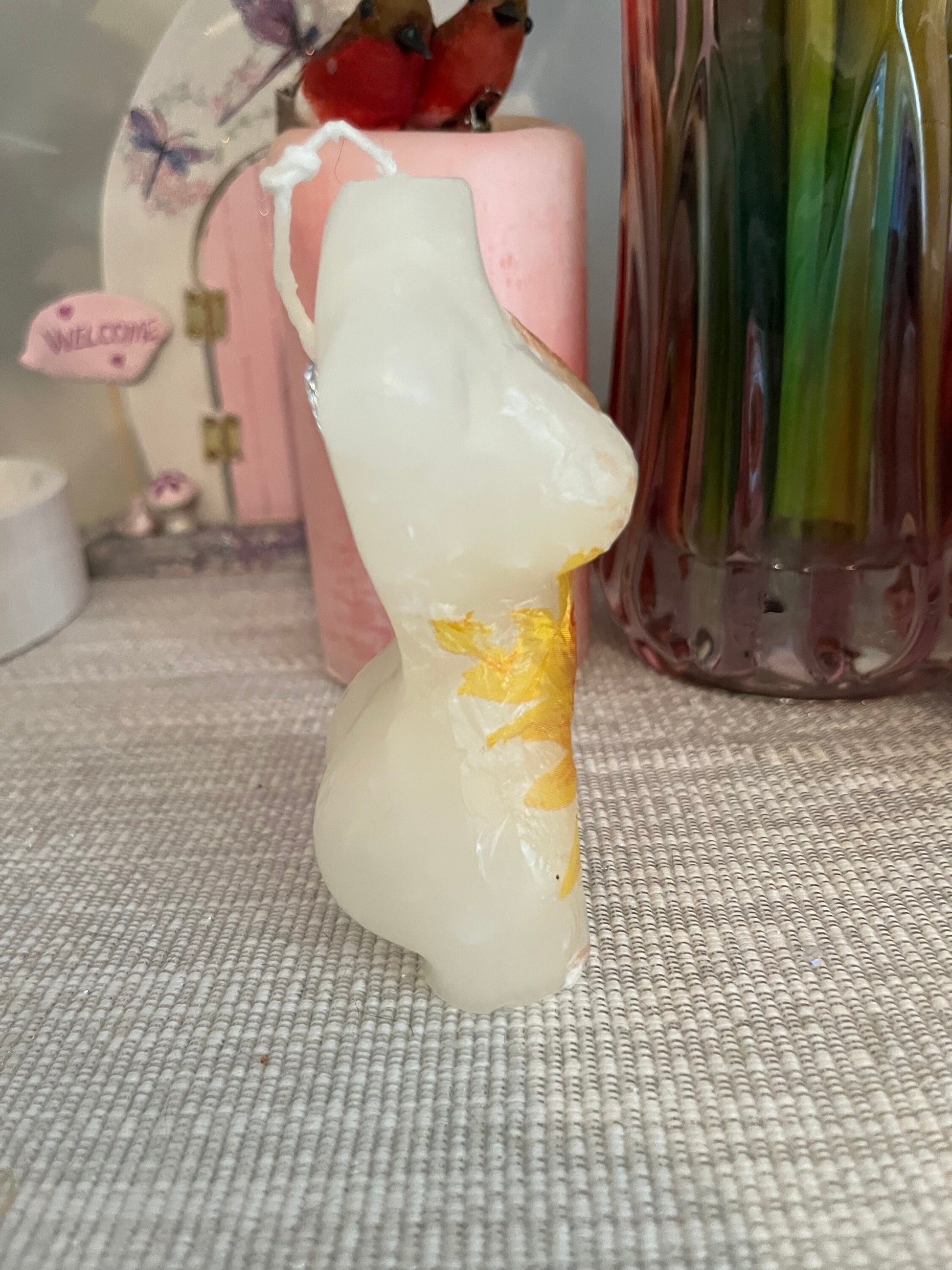 Naked lady figure candle sunflower