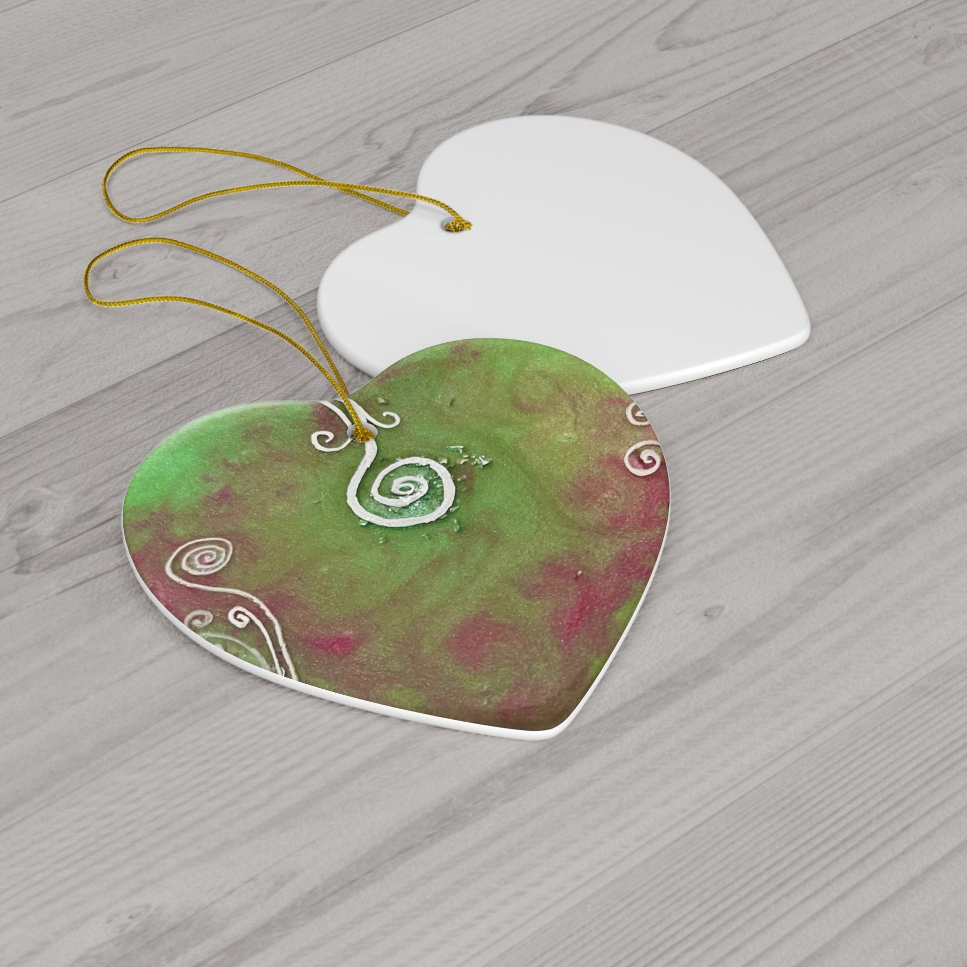 Ceramic Ornament, coaster for energising drinks, contains light codes to release and detox, heart shaped with spirals, pink and green