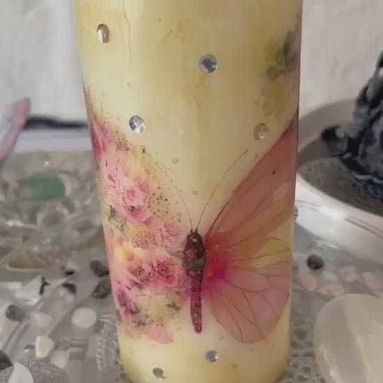 Pillar candle, pink and soft gold floral butterfly design with some sparkles 120hours burning