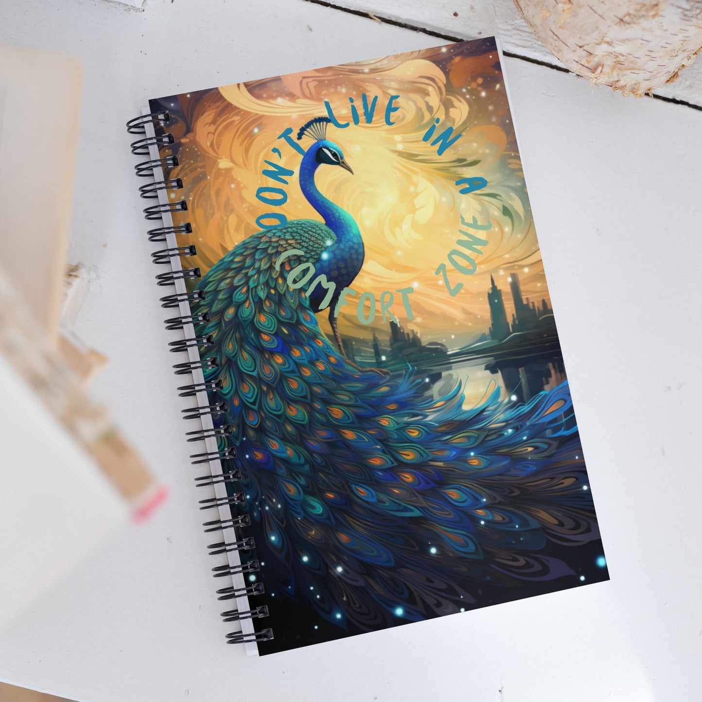 Spiral notebook, bright peacock design with arty design on back, dont stay in a comfort zone.