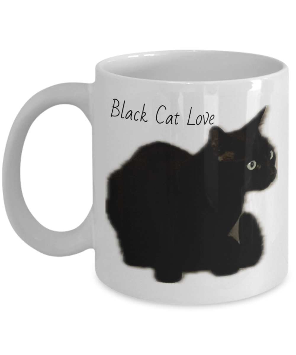 Black cat of the family, 11oz  or 15oz coffee mug, black cat love, black cat squatting, text and image on back of comfortable cat "I am the black cat of the family, I make myself comfortable in all the awkward places