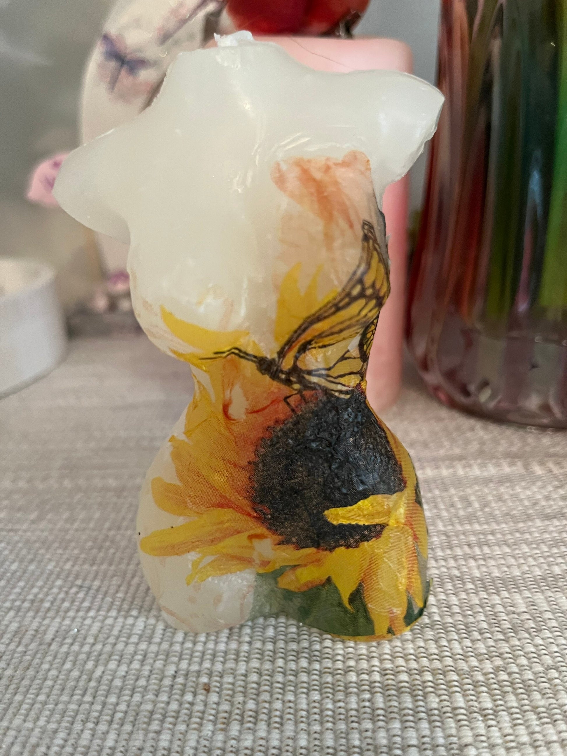 Naked lady figure candle sunflower