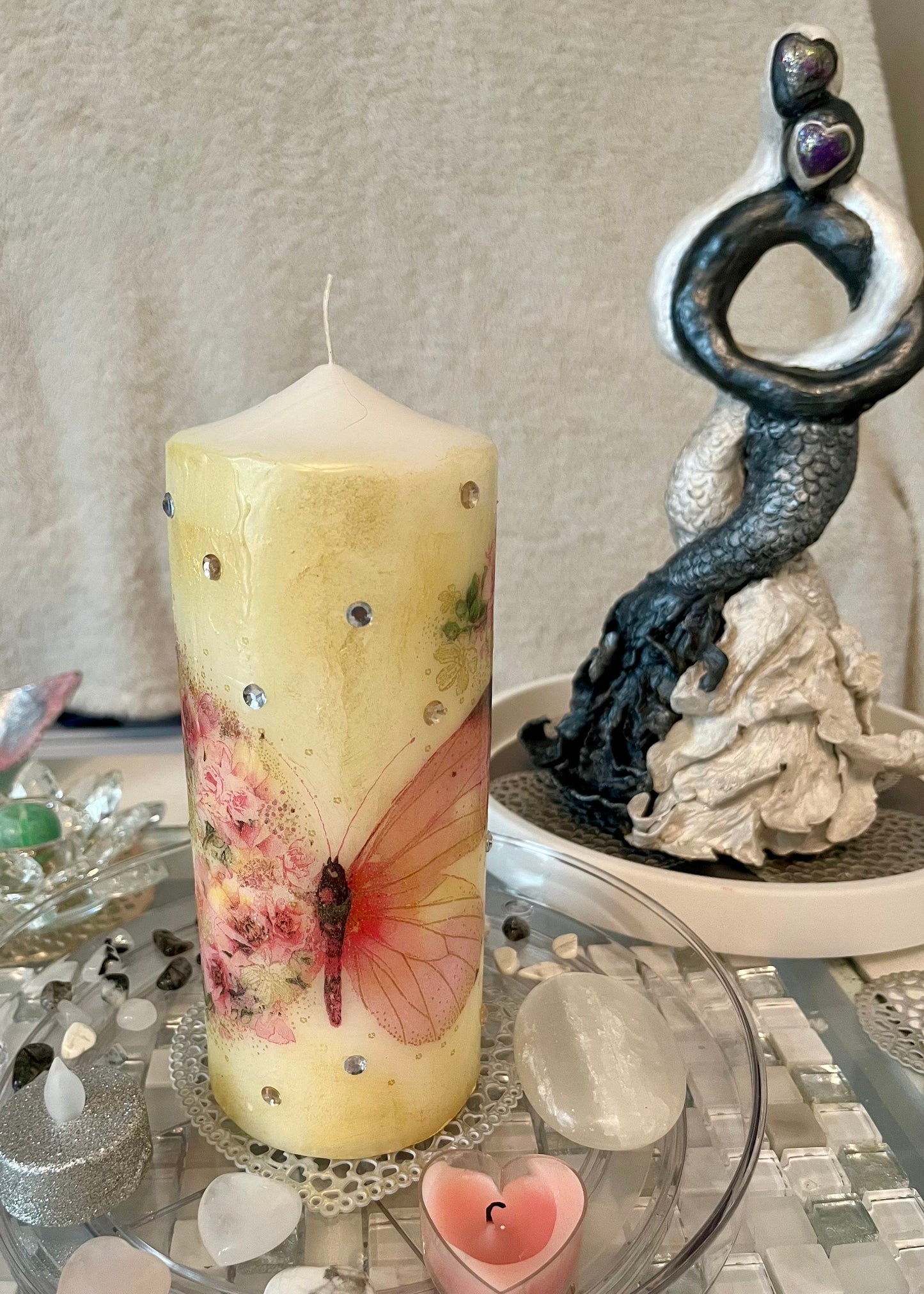 Pillar candle, pink and soft gold floral butterfly design with some sparkles 120hours burning